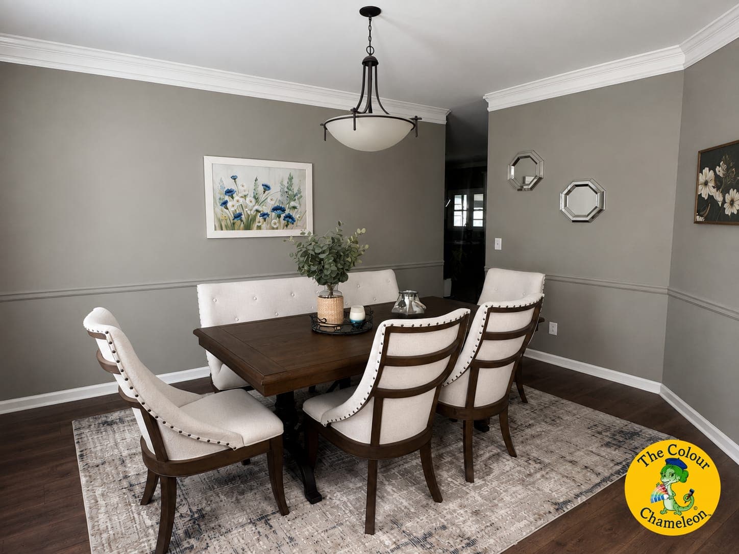 The same dining room in one warm greige, the chair rail painted to disappear