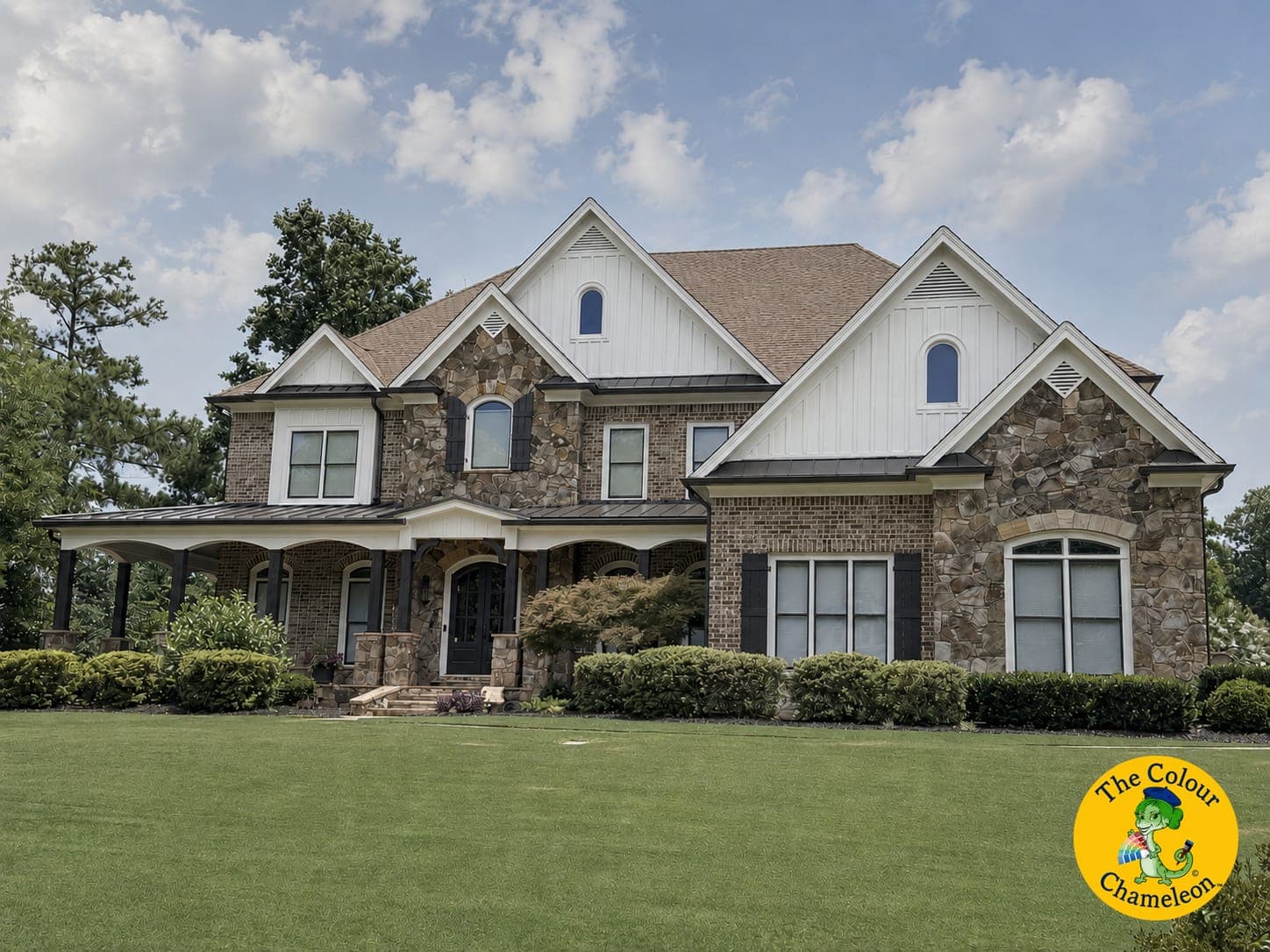 The same house with the gables painted white and the shutters dark gray, brick and stone unchanged